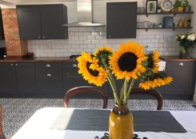 Photo of Sunflowers on a kitchen table